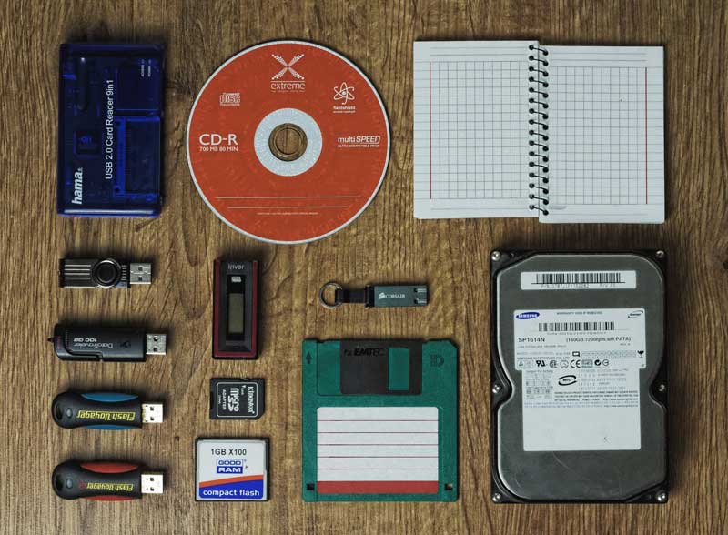 devices for data backup and recovery laid out on a desk